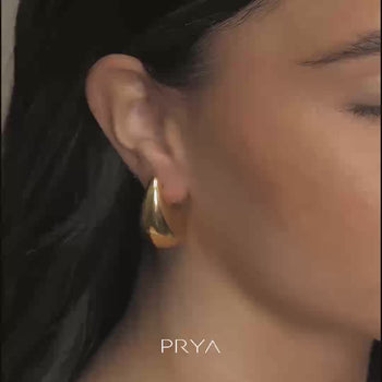 model wearing ella drop earrings 18k gold plated from prya