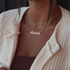 video of model wearing miami name necklace