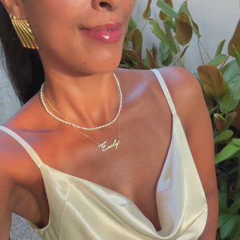video of model wearing Havana personalised name necklace in 18k gold plated stainless steel from prya