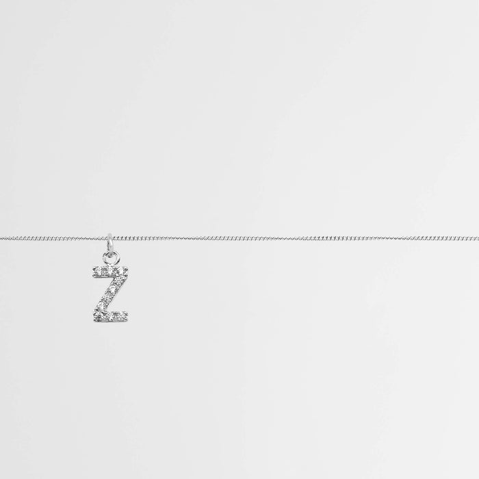 Samara ICY Initial Belly Chain featuring a customizable silver 'Z' initial on a delicate curb chain, ideal for personal style.