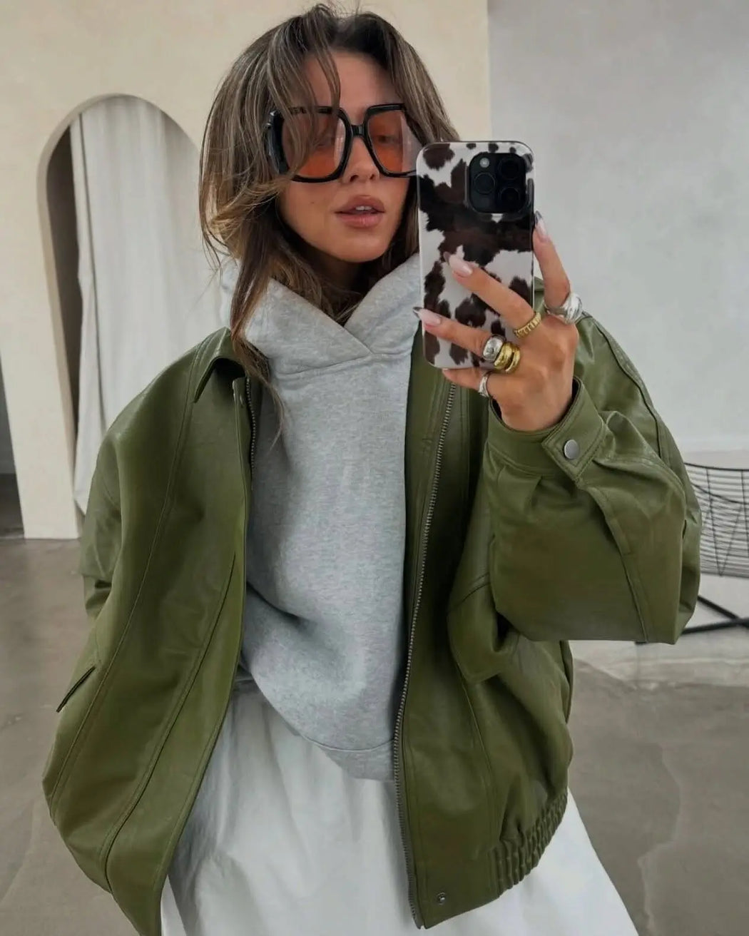 image of model wearing mixed metal ring stacks from prya