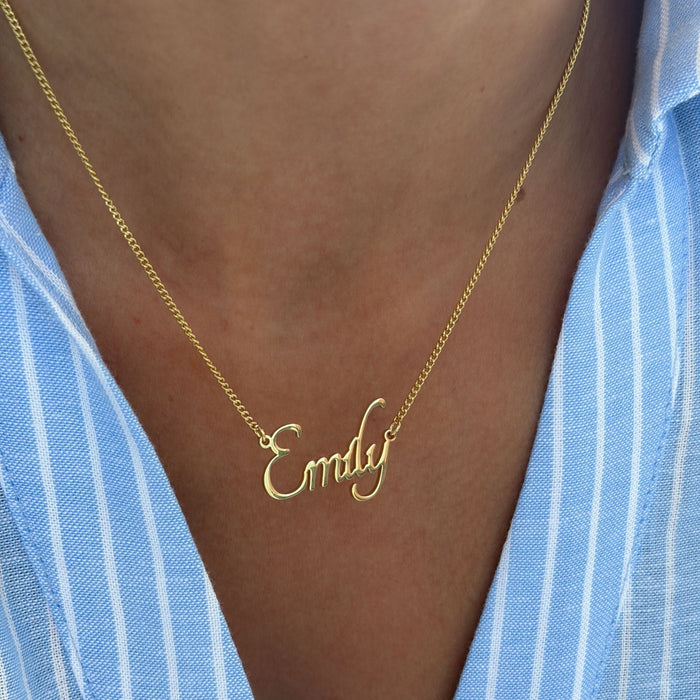 model wearing sierra personalised name necklace in 18k gold plated stainless steel from prya