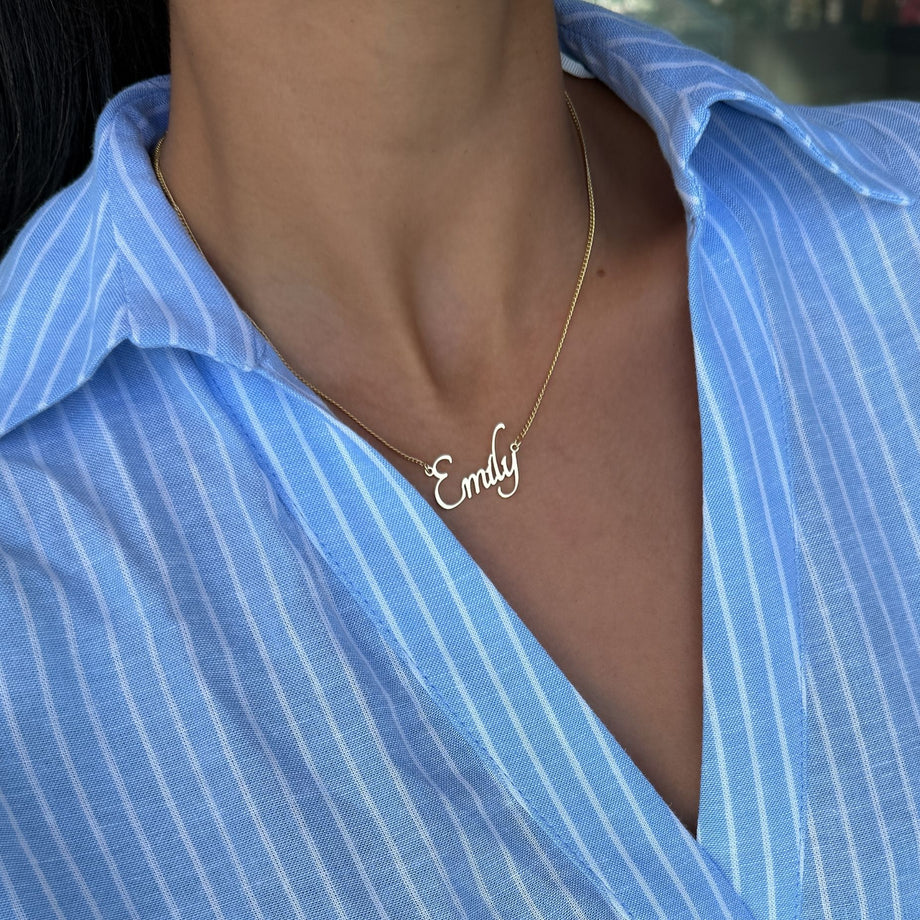 model wearing sierra personalised name necklace in 18k gold plated stainless steel from prya