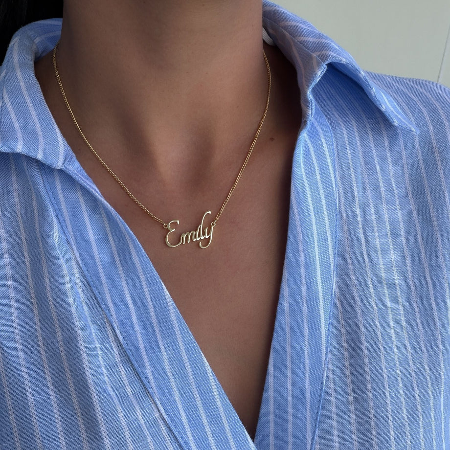model wearing sierra personalised name necklace in 18k gold plated stainless steel from prya