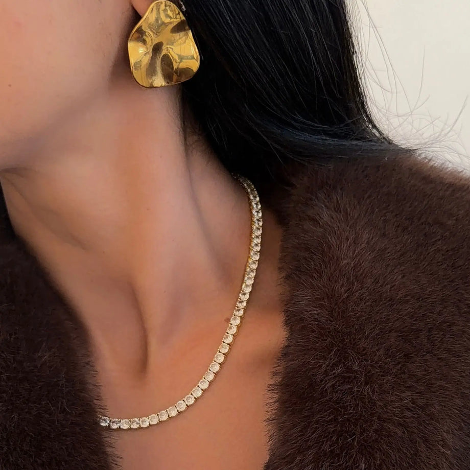 Icy Tennis CZ Necklace in gold and gold statement earrings made by Prya