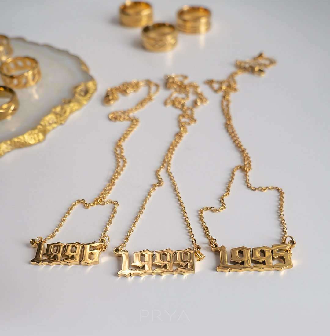  Selection of birth year necklace UK in gold in birth years 1996, 1999 and 1995