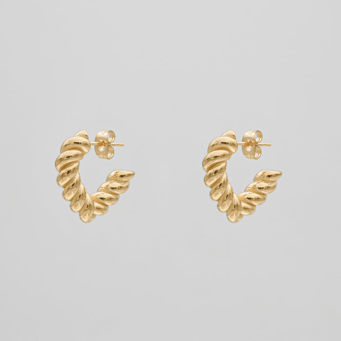 cara twisted half hoop earrings in gold