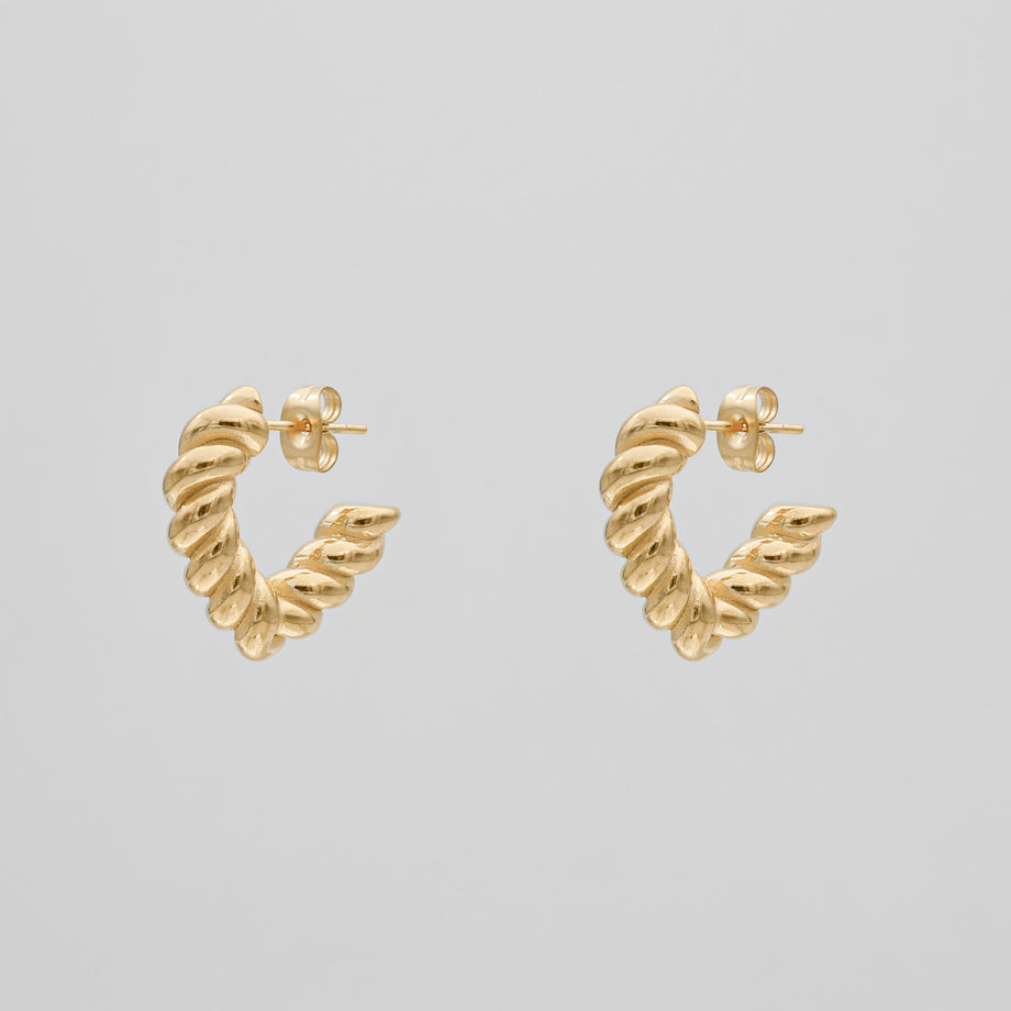 cara twisted half hoop earrings in gold