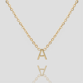 Mini initial necklace in gold