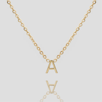 Mini initial necklace in gold