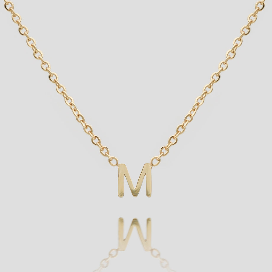 Mini initial necklace in gold