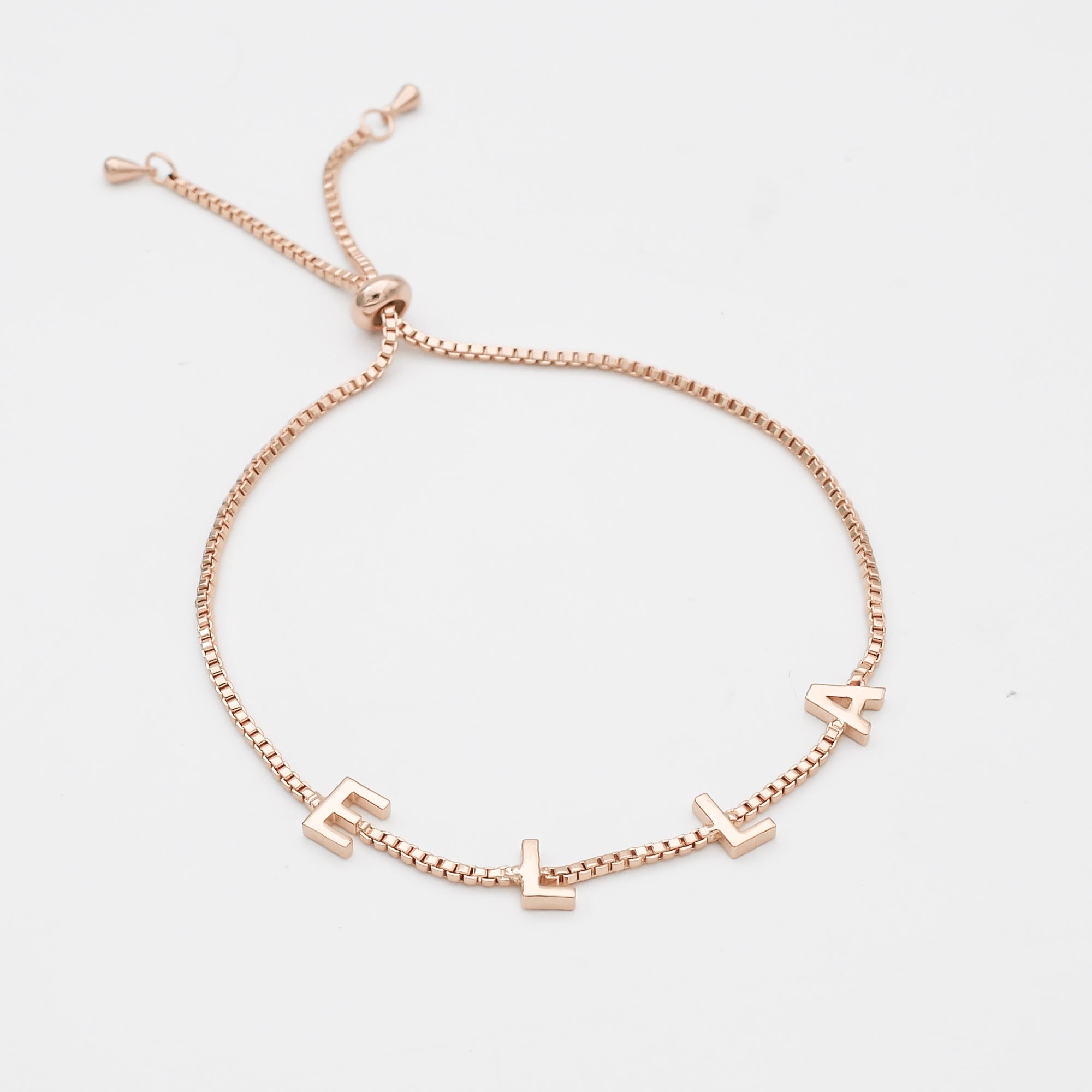 Classic personalised name bracelet in 14K rose gold with charm