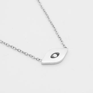 close up of Evil Eye necklace in silver with black and white motif in the centre