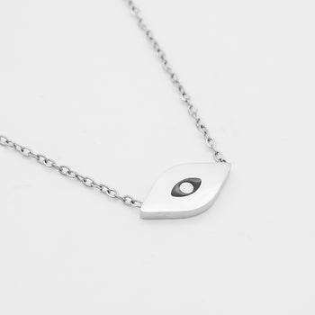 close up of Evil Eye necklace in silver with black and white motif in the centre