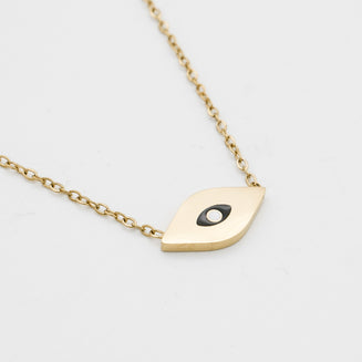 close up Evil Eye necklace in Gold with black and white motif in the centre