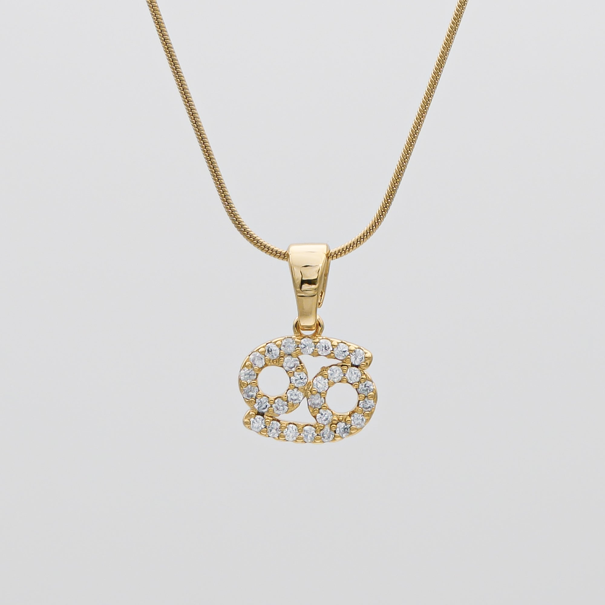 Gold ICY Zodiac Cancer Symbol Pendant Necklace by PRYA
