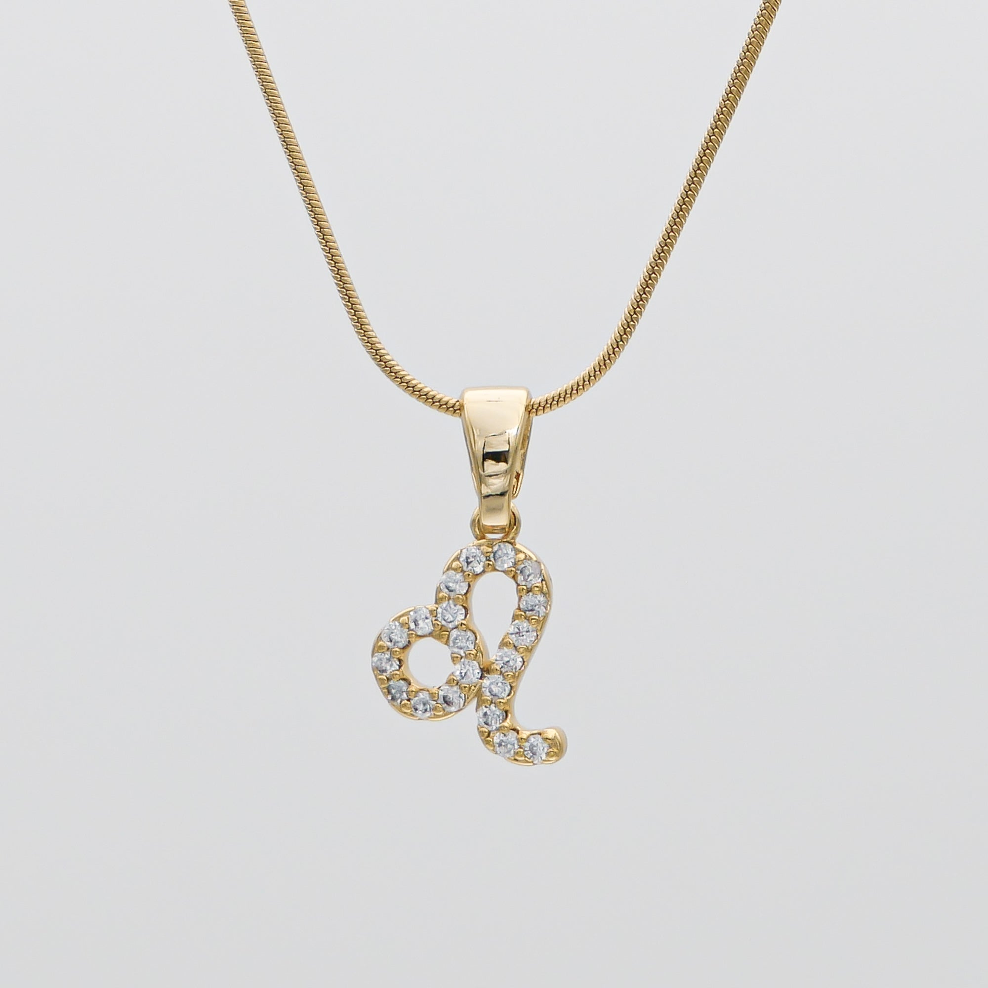 Gold ICY Zodiac Leo Symbol Pendant Necklace by PRYA