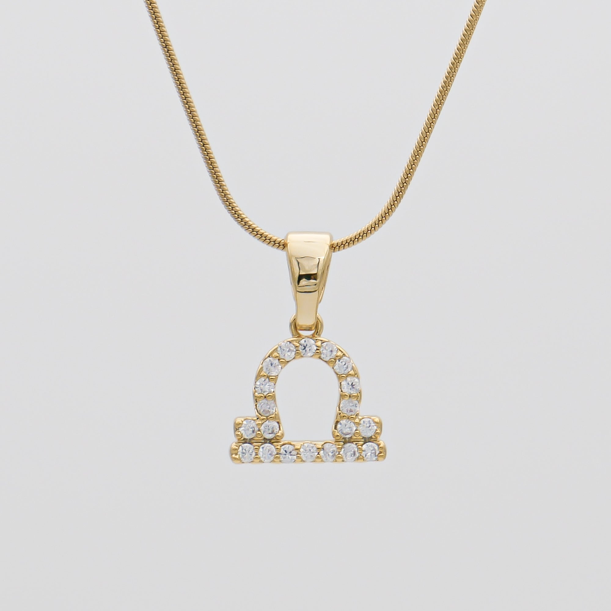 Gold ICY Zodiac Libra Symbol Pendant Necklace by PRYA