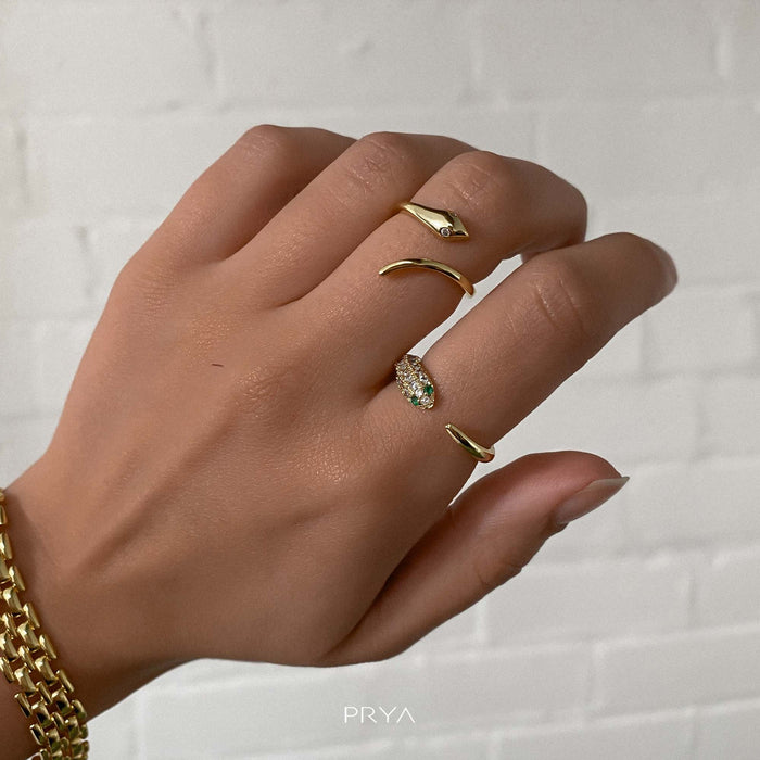 model wearing Gold snake ring with CZ eyes