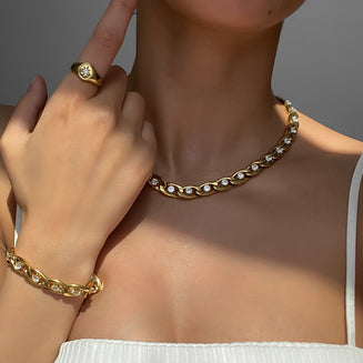 model wearing Alina CZ Bracelet in gold prya