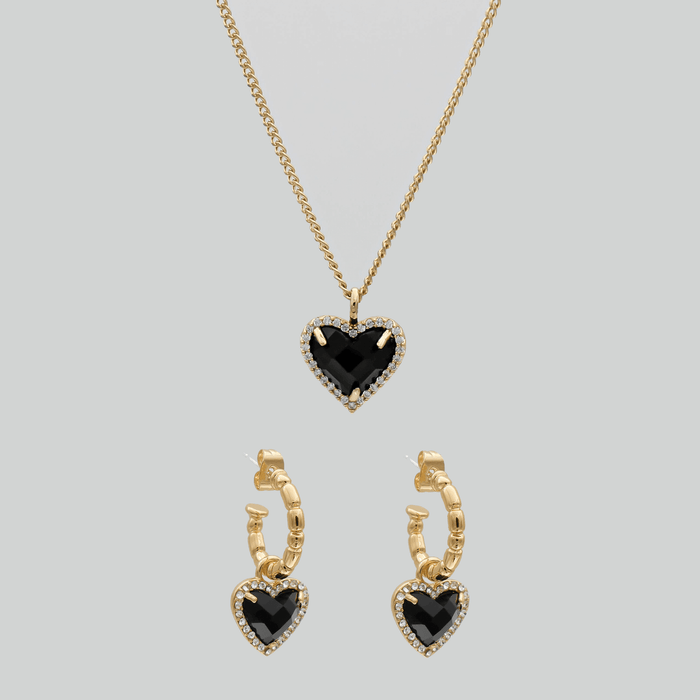 Gold heart necklace and earrings set.