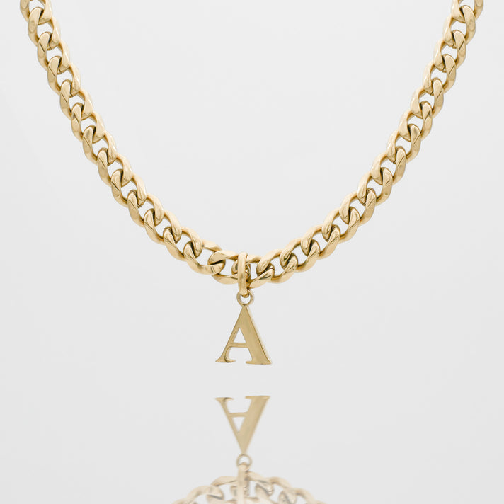 Gold chain necklace with letter "A" pendant.