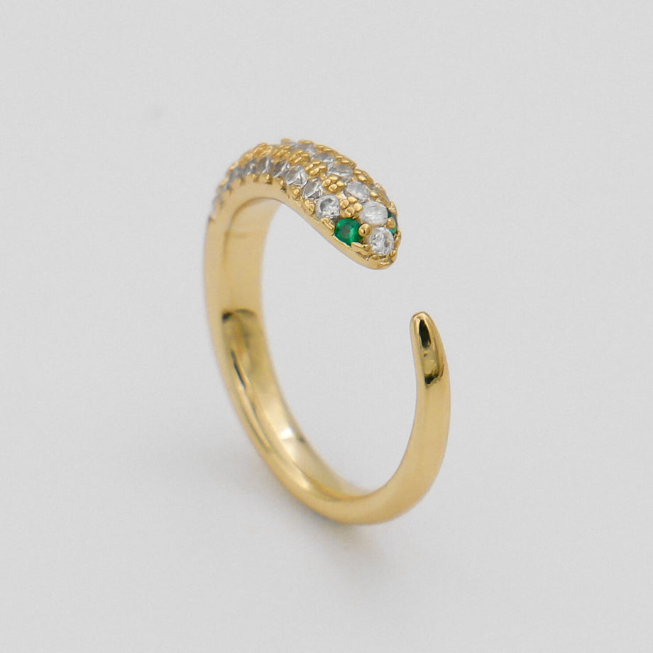 Gold snake ring with diamond detailing.