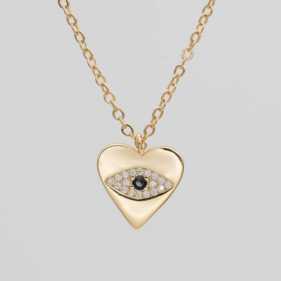 Gold Heart Pendant with a paved CZ Evil Eye.