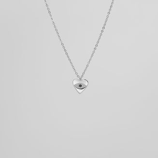 Silver Heart Pendant with a paved CZ Evil Eye.