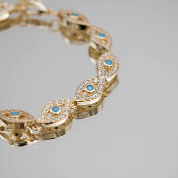 close up of Gold Evil eye bracelet  paved with CZ stones