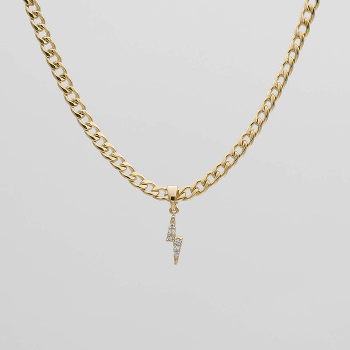 Gold chain with lightning bolt pendant.