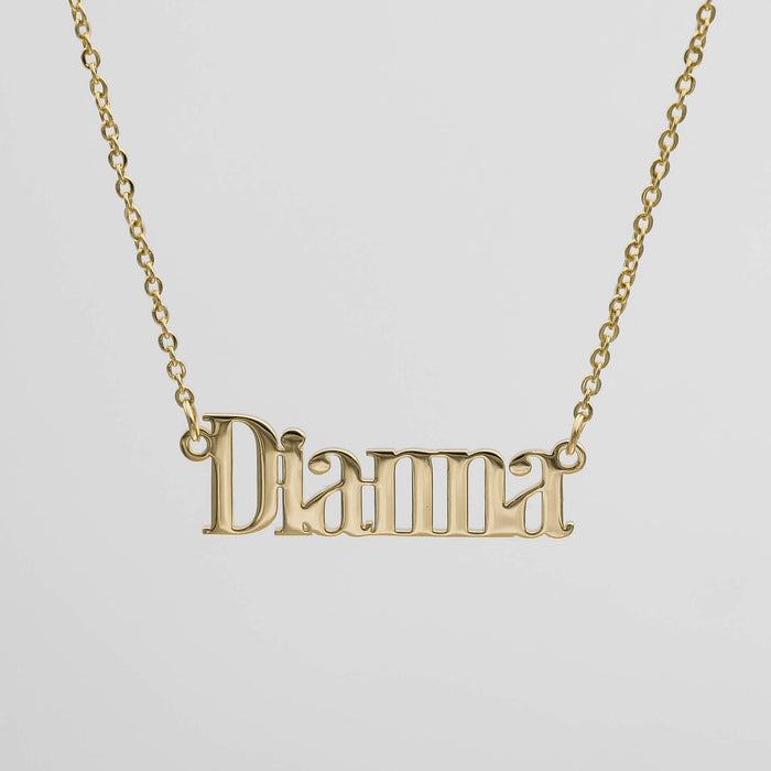 Gold "Dianna" name necklace on chain.