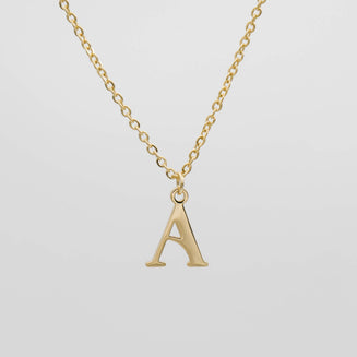 18k gold initial necklace featuring a beautifully crafted letter 'A' pendant on a classic chain