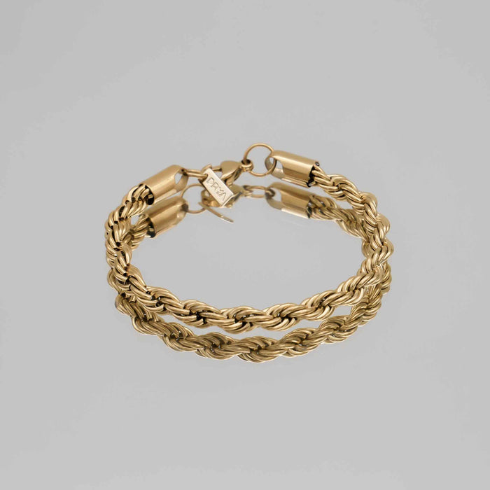 Gold twisted rope bracelet with clasp.