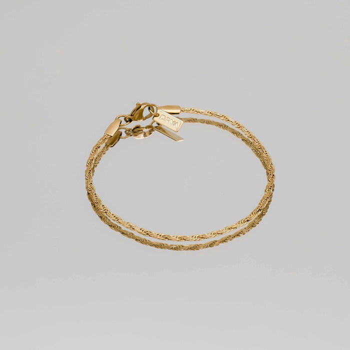 Gold rope chain bracelet with clasp.