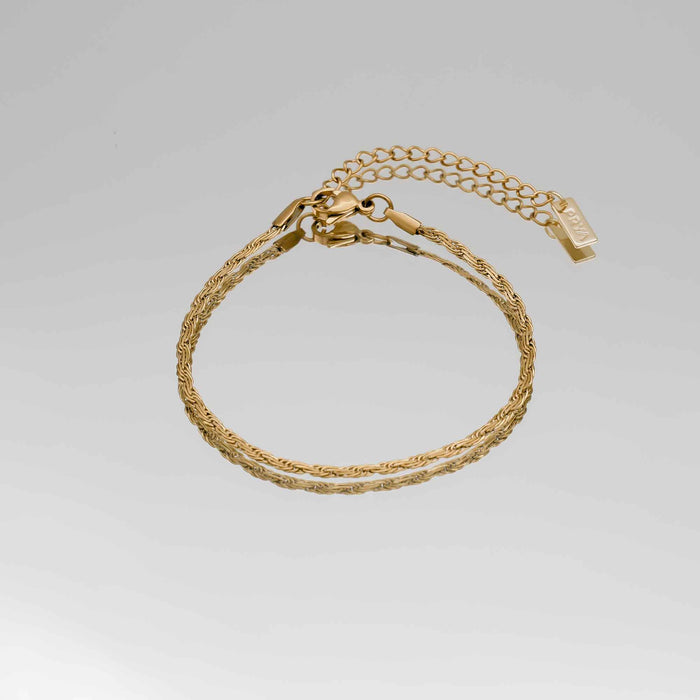 Gold braided bracelet with adjustable chain.