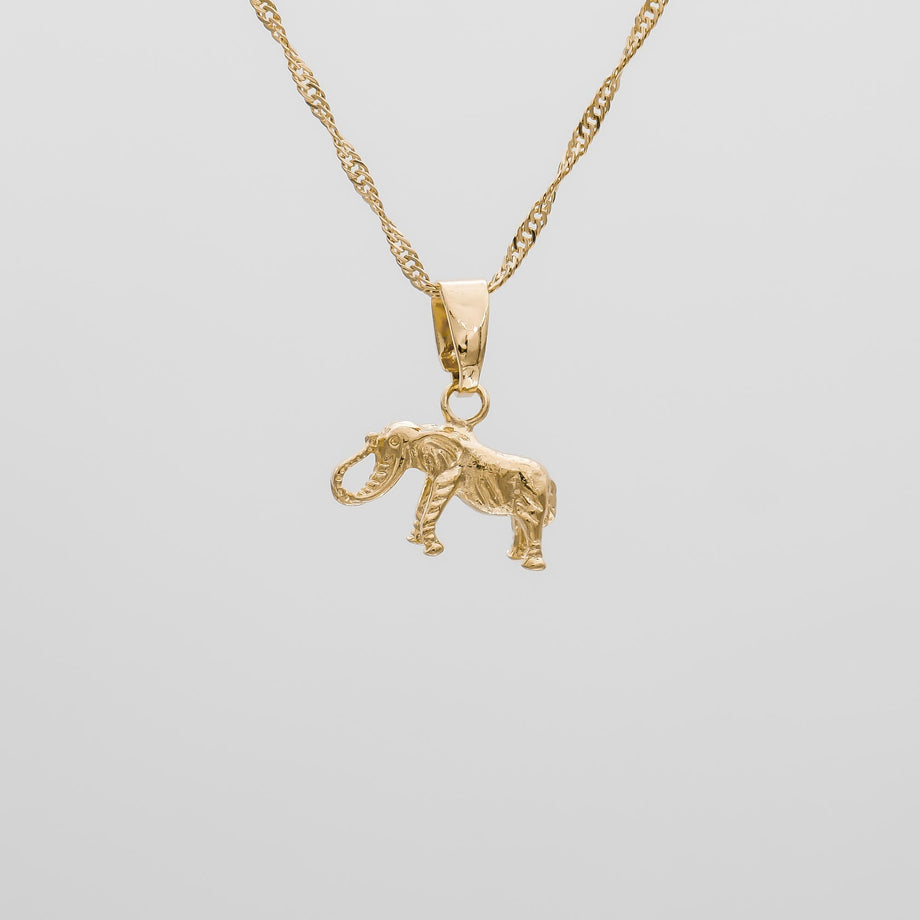 Gold elephant pendant on a twisted chain.