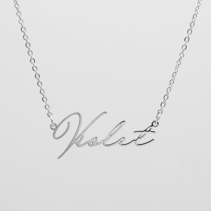 Model wearing Personalised signature name necklace in Silver gold classic link chain made by PRYA UK 