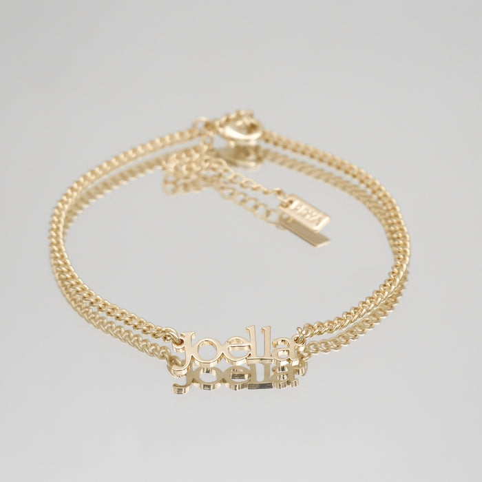 Gold anklet with custom name "Joella".