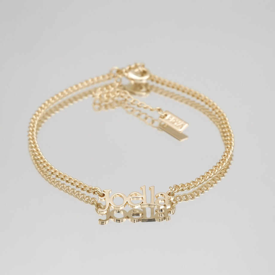 Gold anklet with custom name "Joella".