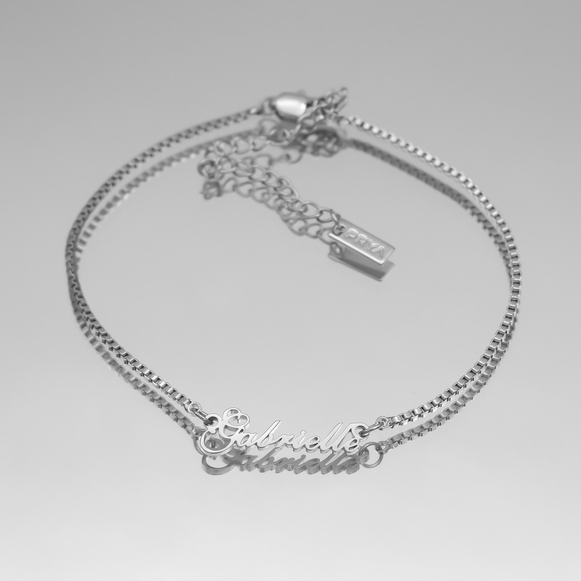 Silver Siena name anklet on a box chain