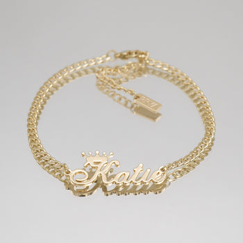 Yellow gold personalised name anklet with Cuban link chain.