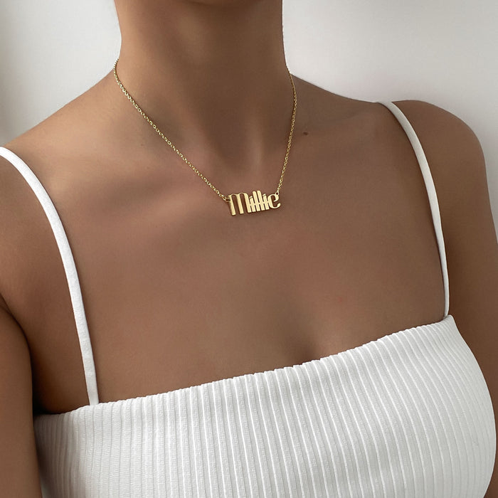 model wearing the gold plated custom name necklace