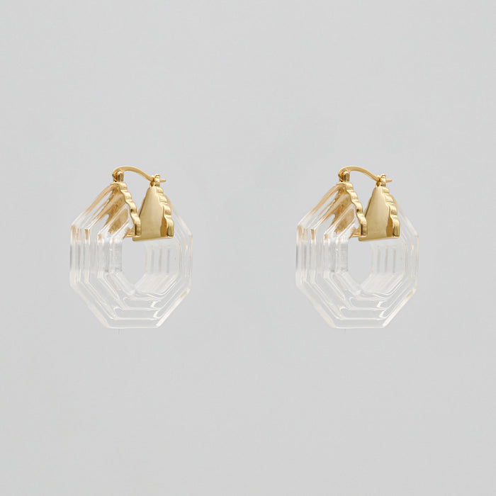 Gold and clear geometric earrings.