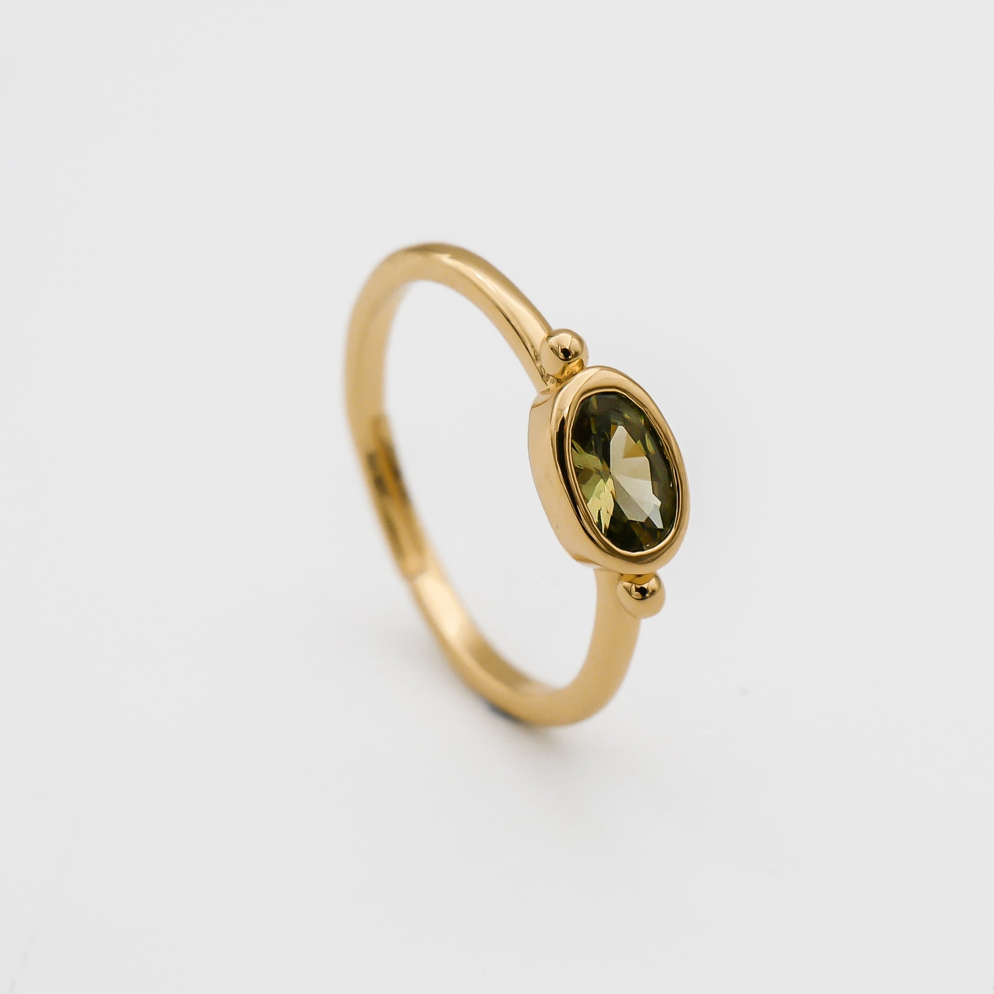 Birthstone ring gold for August with peridot