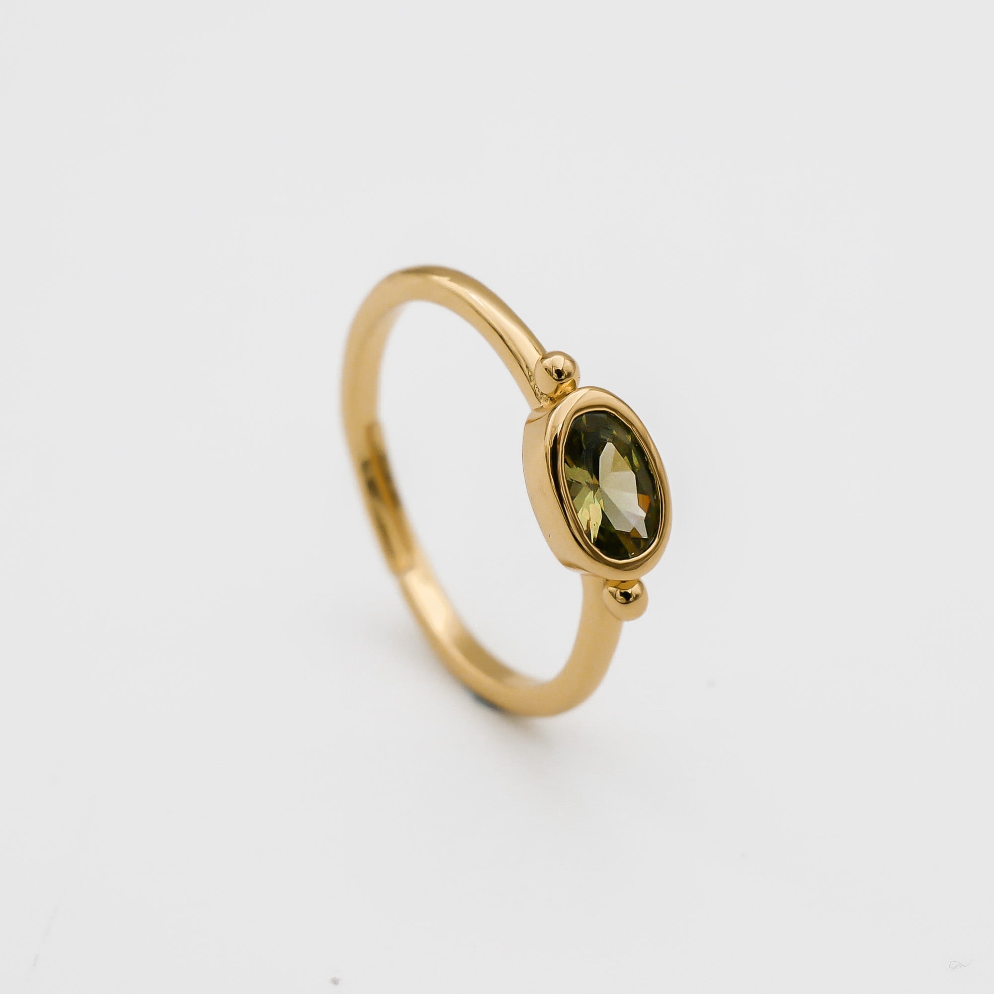 Birthstone jewellery for August with peridot ring