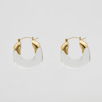 Clear Celine lucite hoop with an oval shape