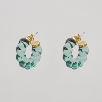 Candi hoop earrings with twisted jelly-like design in blue