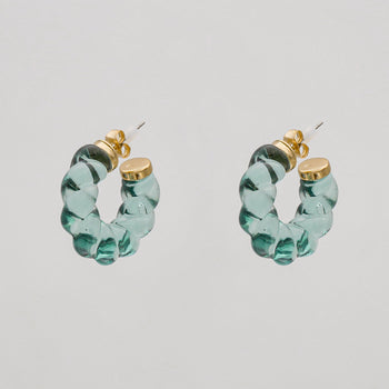 Candi hoop earrings with twisted jelly-like design in blue