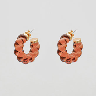 Candi hoop earrings with twisted jelly-like design in orange